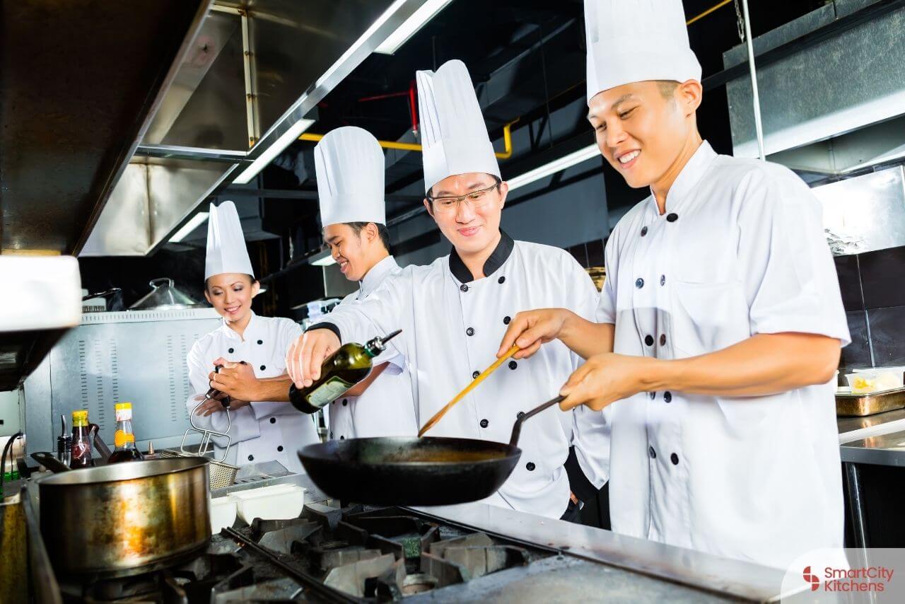 group-of-asian-chef-cooking-in-restaurant-kitchen-cuisines