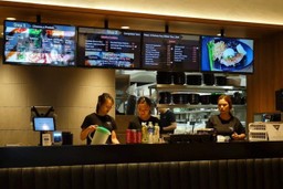 asian-employees-staff-serving-behind-counter